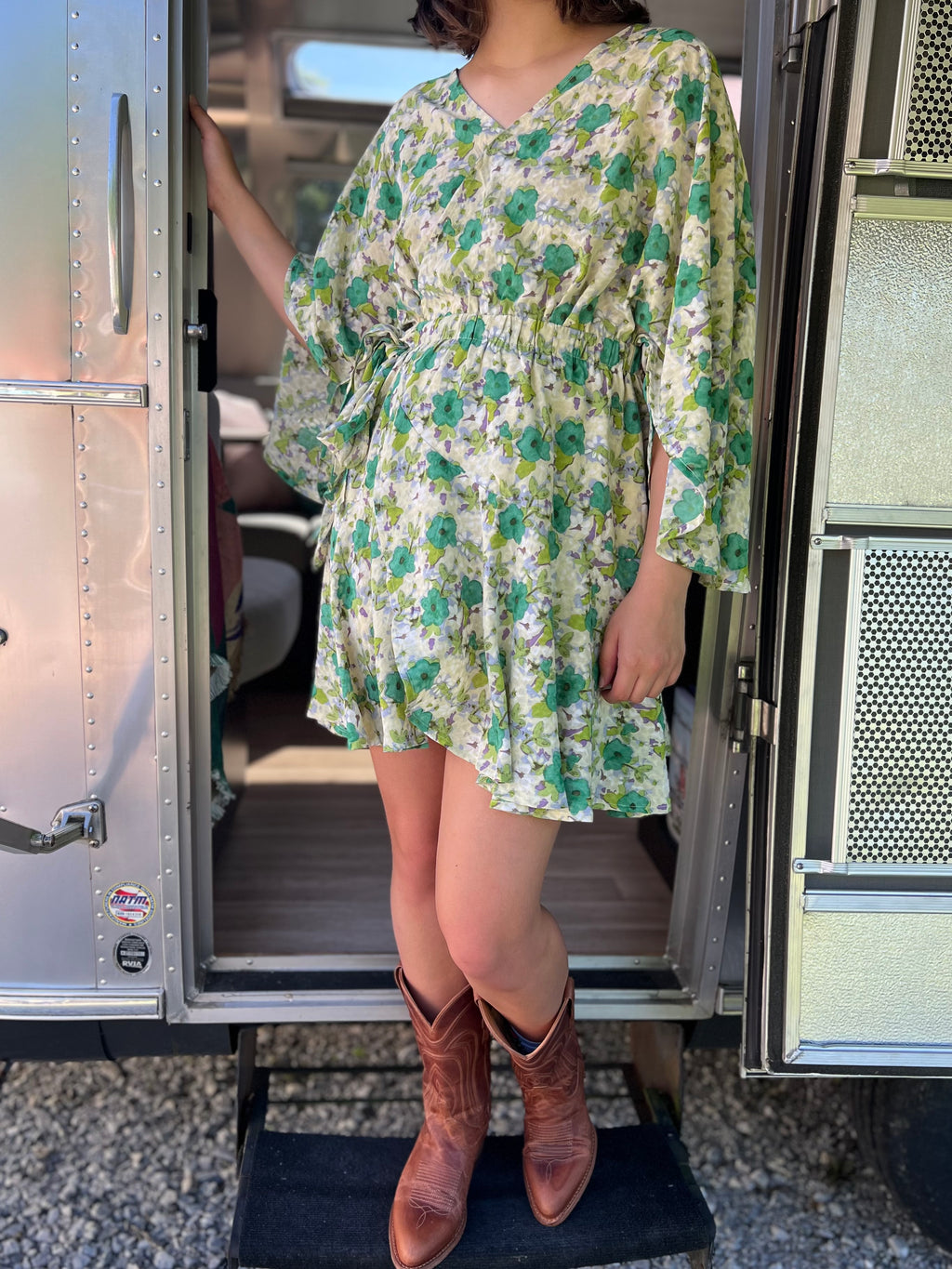 green wrap dress with shorts
