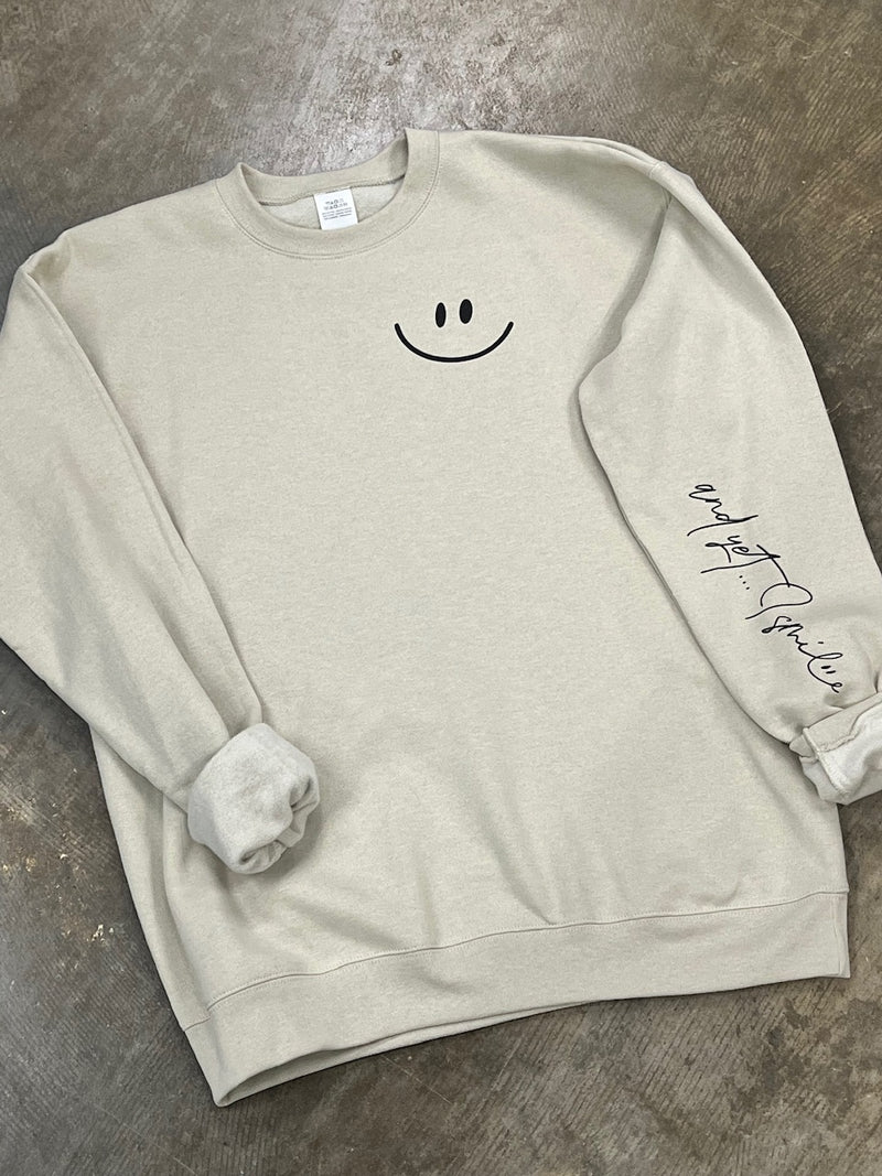 …and yet I smile Sweatshirt