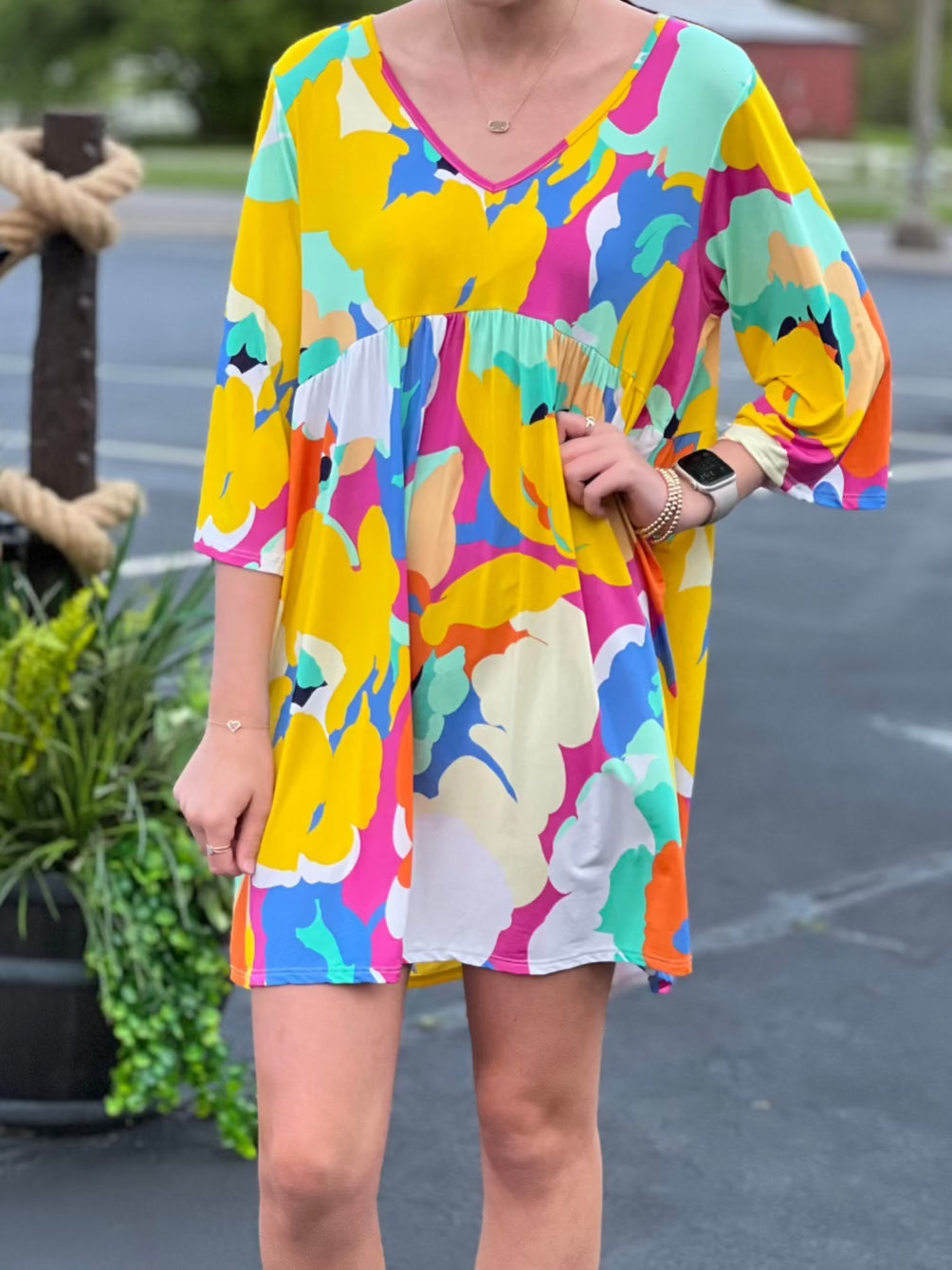 bold floral knee ;length dress with 3/4 sleeves