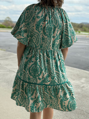 green/white paisley dress