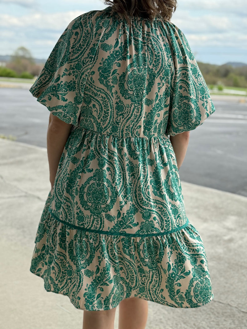 green/white paisley dress