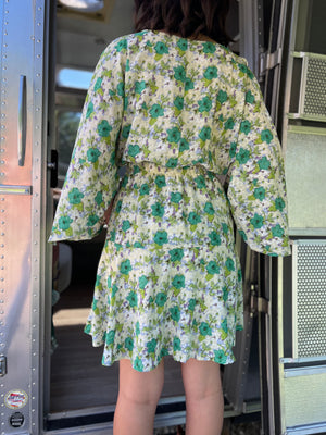 green wrap dress with shorts